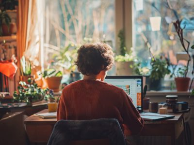 medium-shot-man-living-as-digital-nomad